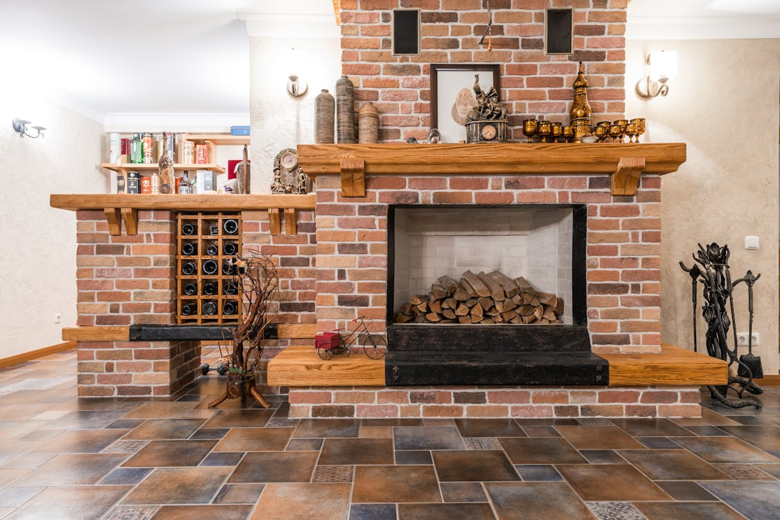 how to remodel without losing character featuring restored brick fireplace and architectural details