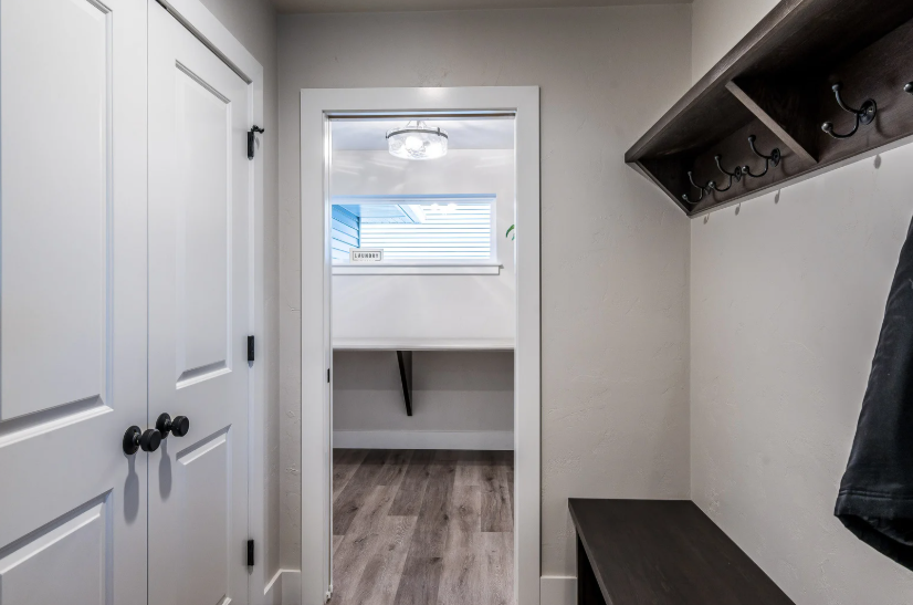 mudroom remodel ideas with storage bench wall hooks and organized entryway design