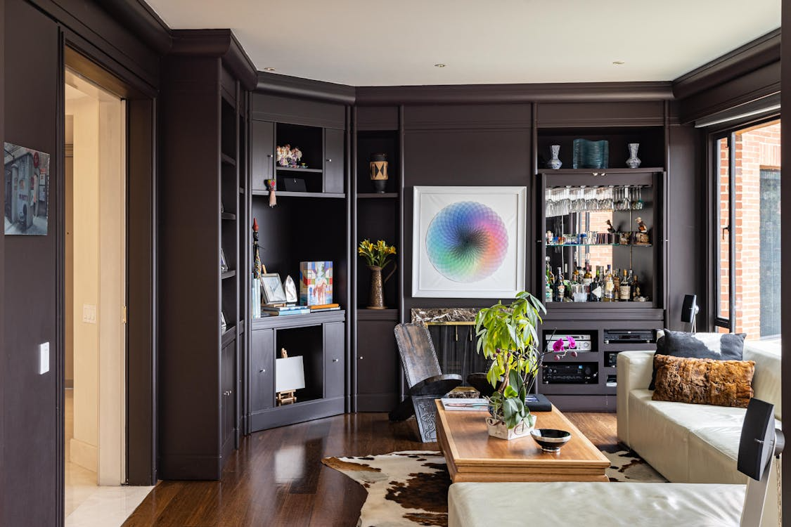 storage solutions to add during a remodel featuring built-in shelving and custom cabinetry