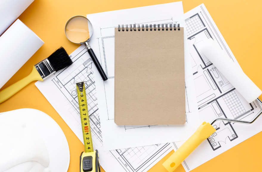 home remodeling project timeline planning with blueprints tools and renovation measurements